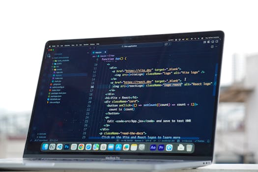Coding on a laptop outdoors, showcasing a rooftop urban lifestyle in Surat, India.
