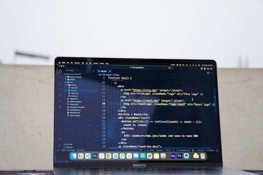 Laptop displaying code outdoors, ideal for remote work or freelance programming.